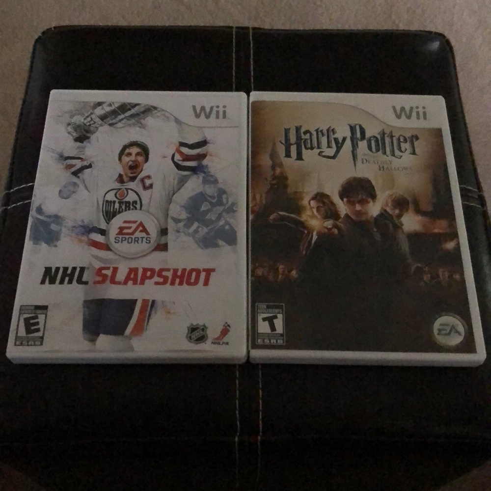Two Wii games. Harry Potter and NHL Slapshot.